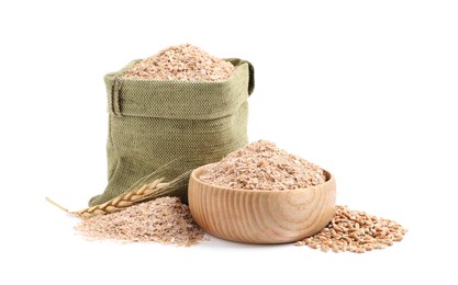 Photo of Wheat bran in sack and bowl on white background