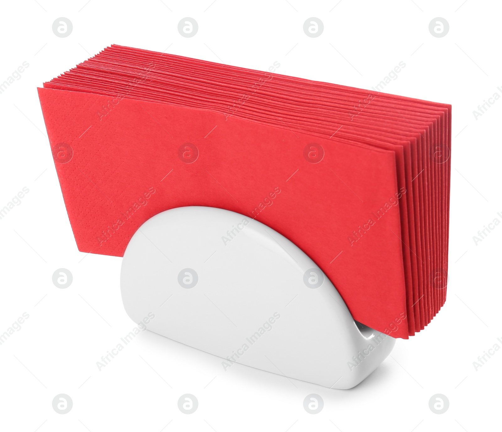 Photo of Ceramic napkin holder with paper serviettes on white background