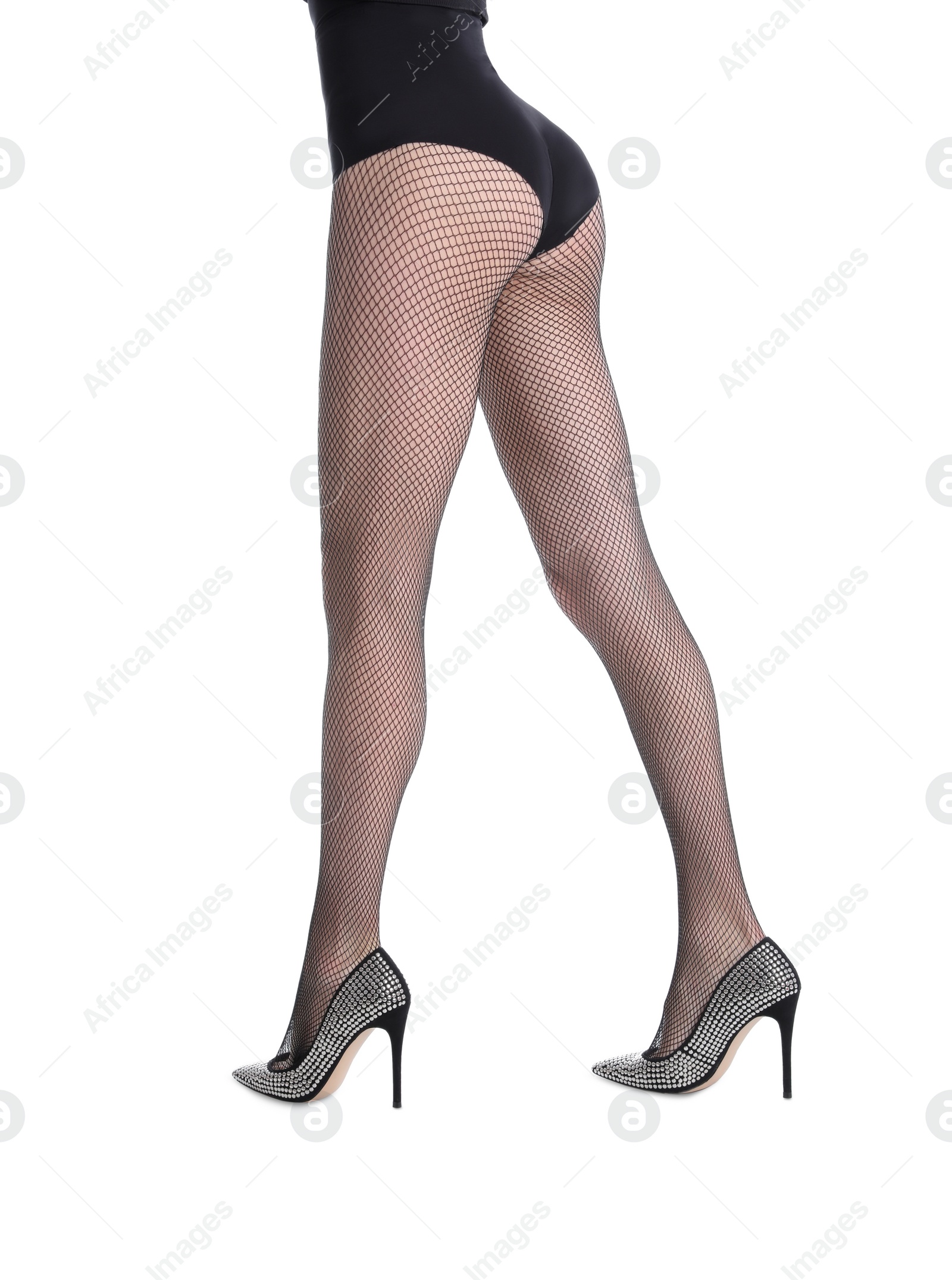 Photo of Woman wearing black tights and stylish shoes isolated on white, closeup of legs