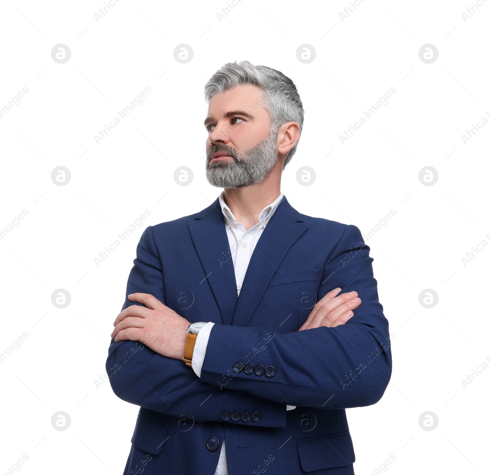 Photo of Mature businessman in stylish clothes posing on white background, low angle view