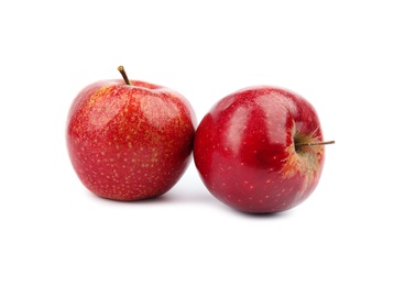 Photo of Ripe juicy red apples on white background