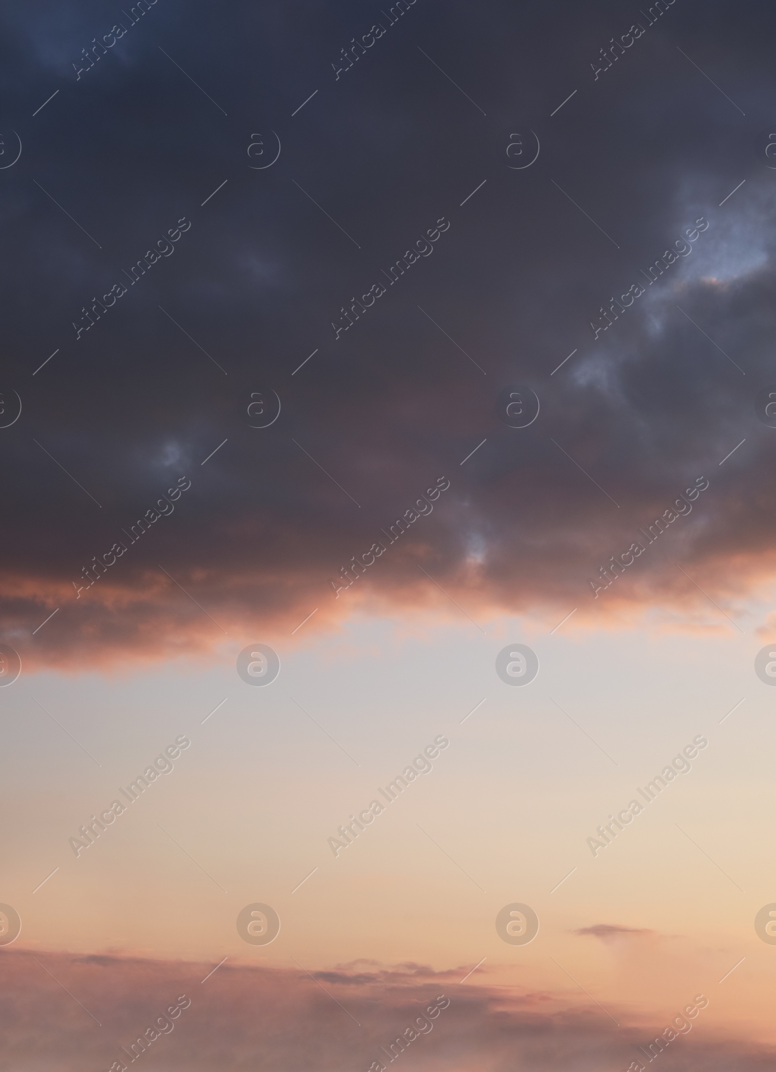 Photo of Picturesque view of sunset with beautiful clouds over city. Stormy weather