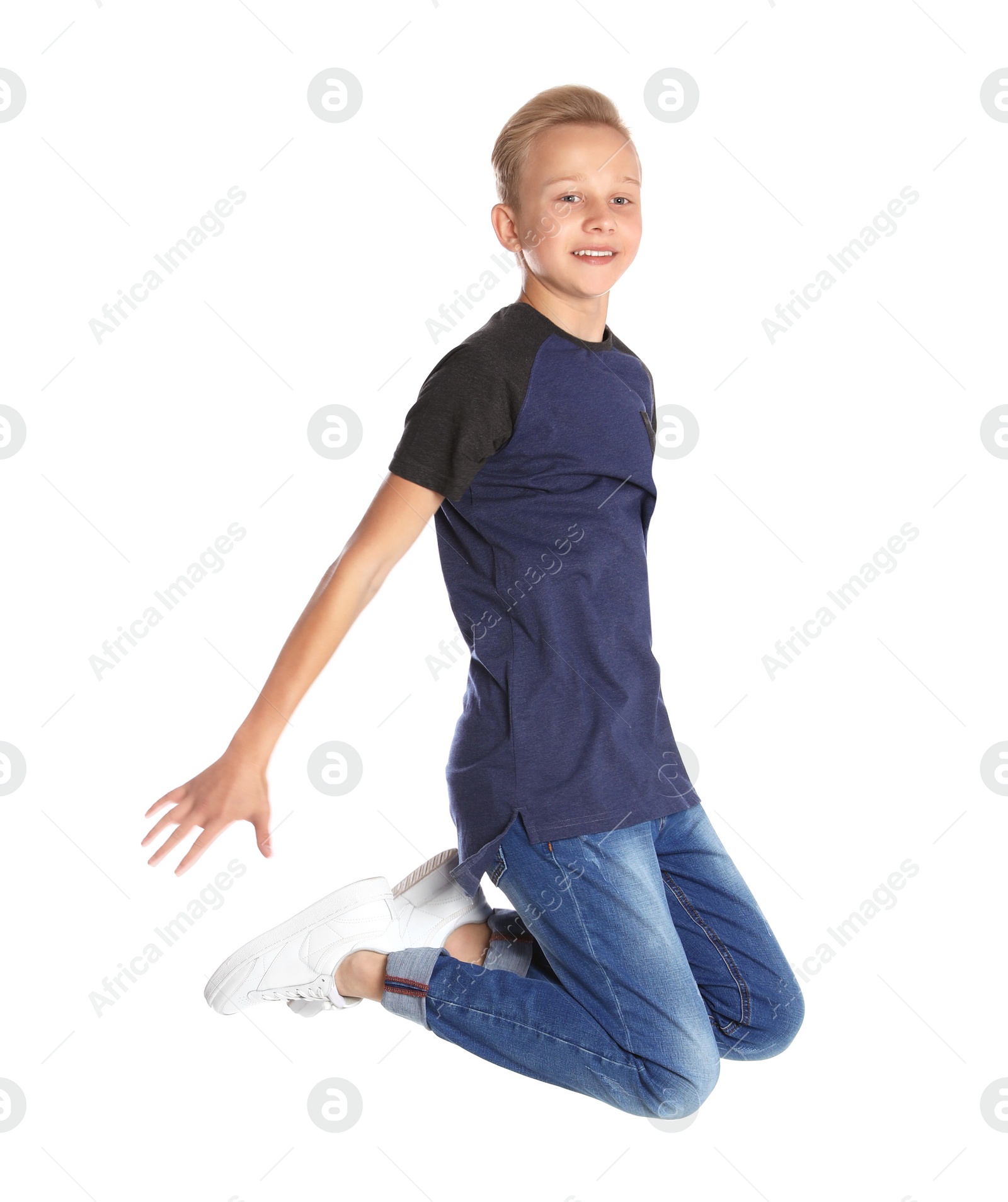 Photo of Full length portrait of teenage boy on white background