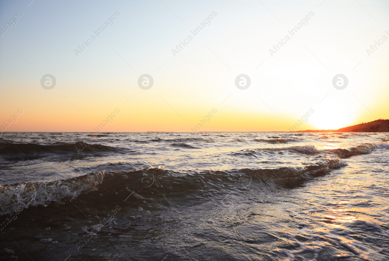 Photo of Beautiful view of sea coast at sunset