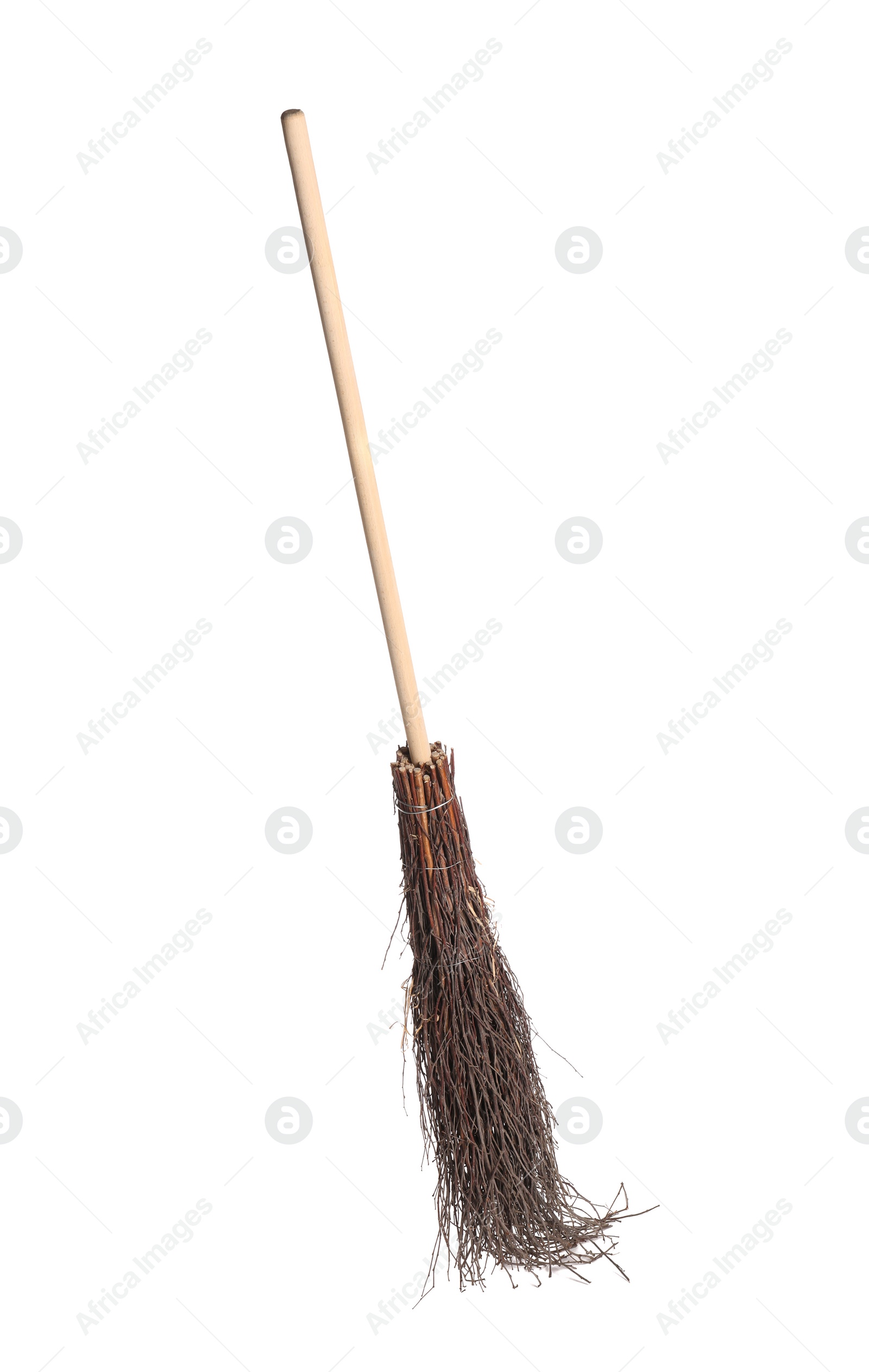 Photo of Old broom with wooden handle isolated on white