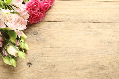 Happy Mother's Day. Beautiful flowers on wooden table, space for text