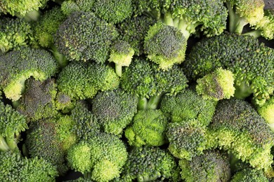 Fresh raw broccoli as background, top view