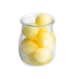 Photo of Glass jar of melon balls on white background