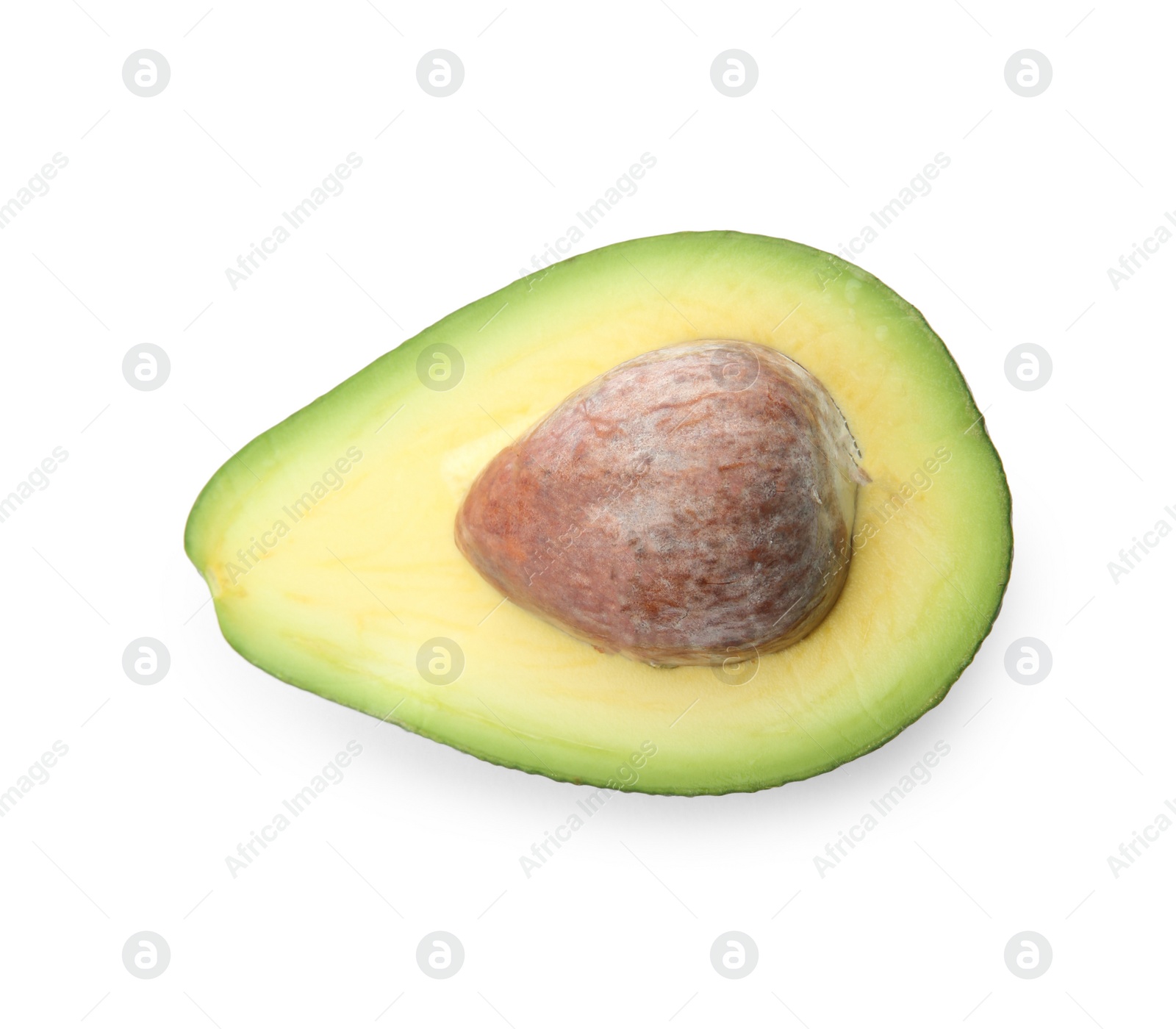 Photo of Half of ripe avocado with pit on white background