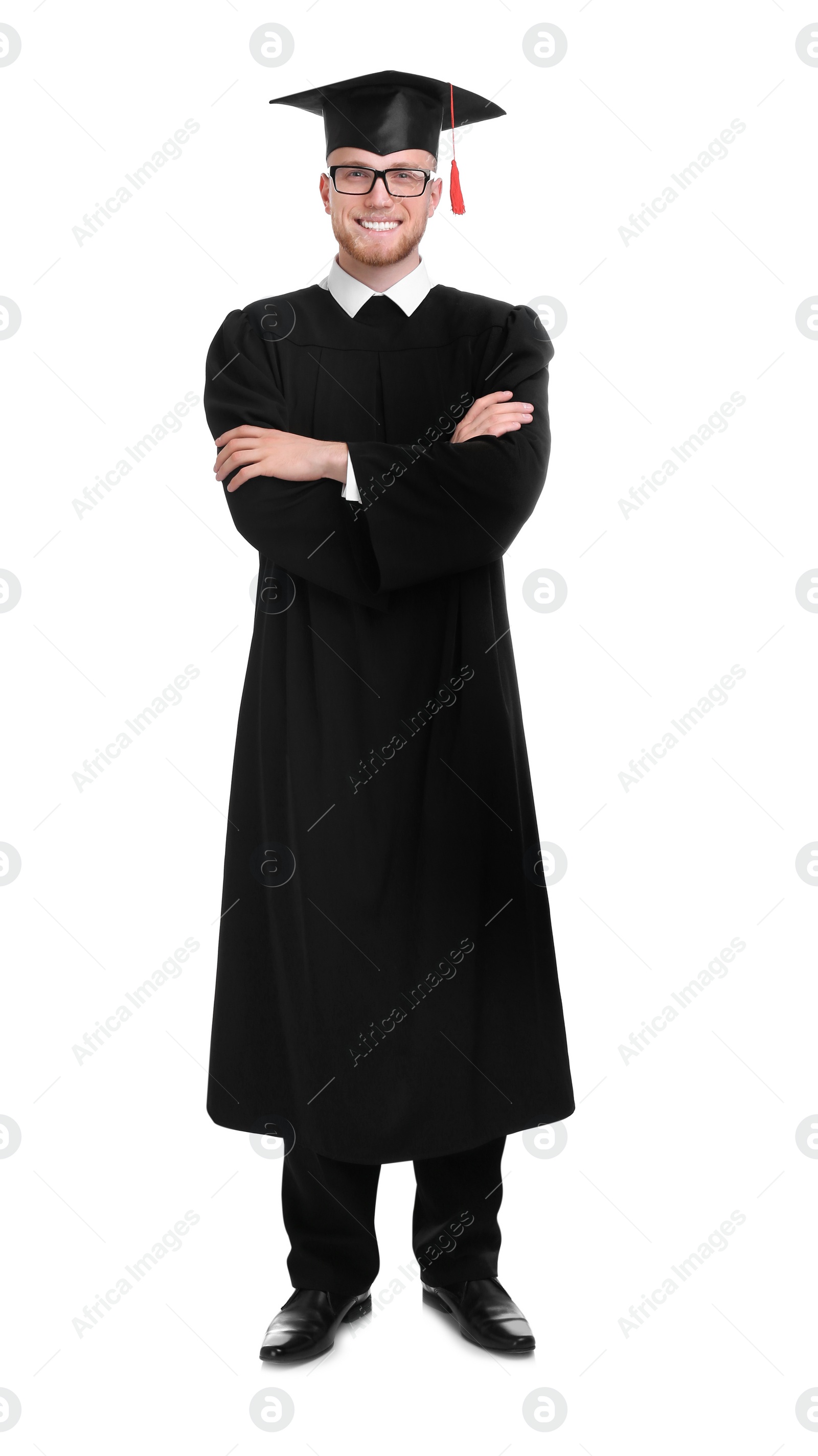 Photo of Happy student wearing graduation hat on white background