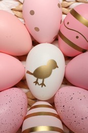 Photo of Festively decorated Easter eggs as background, closeup view