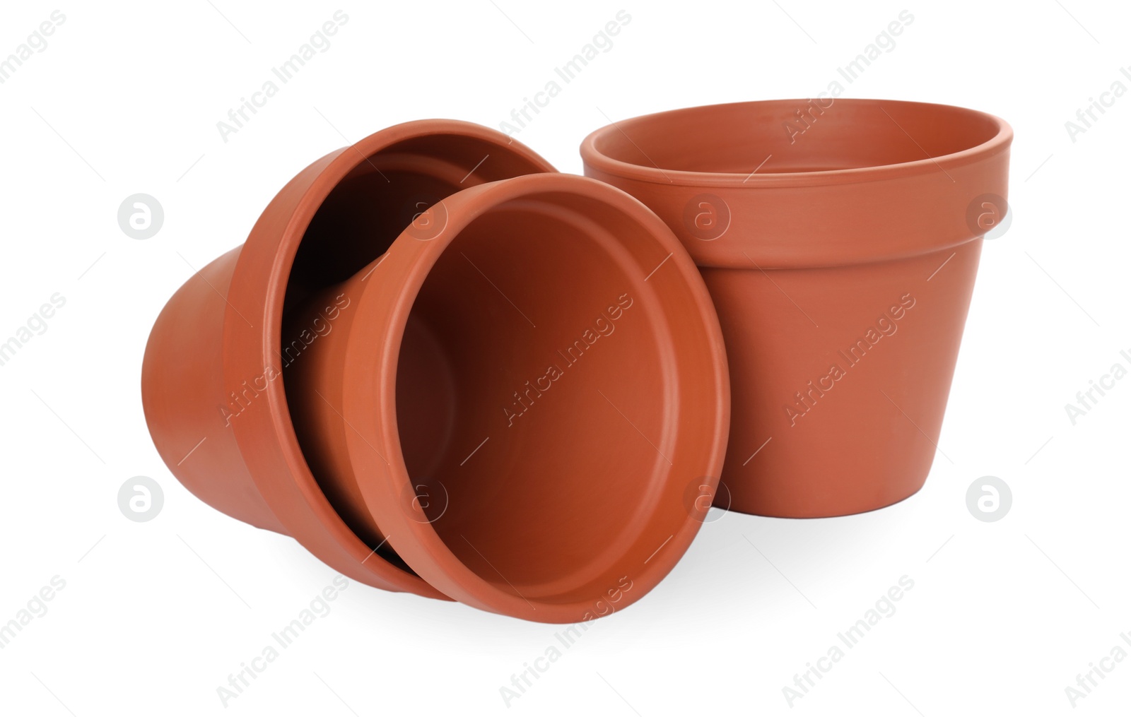 Photo of Empty clay flower pots isolated on white