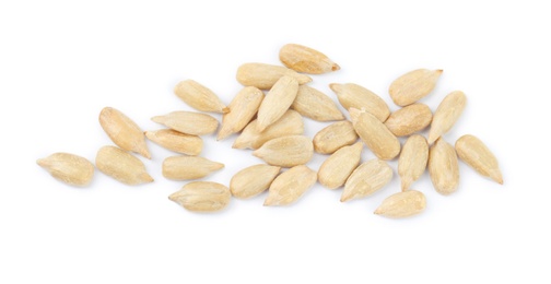 Peeled sunflower seeds on white background, top view