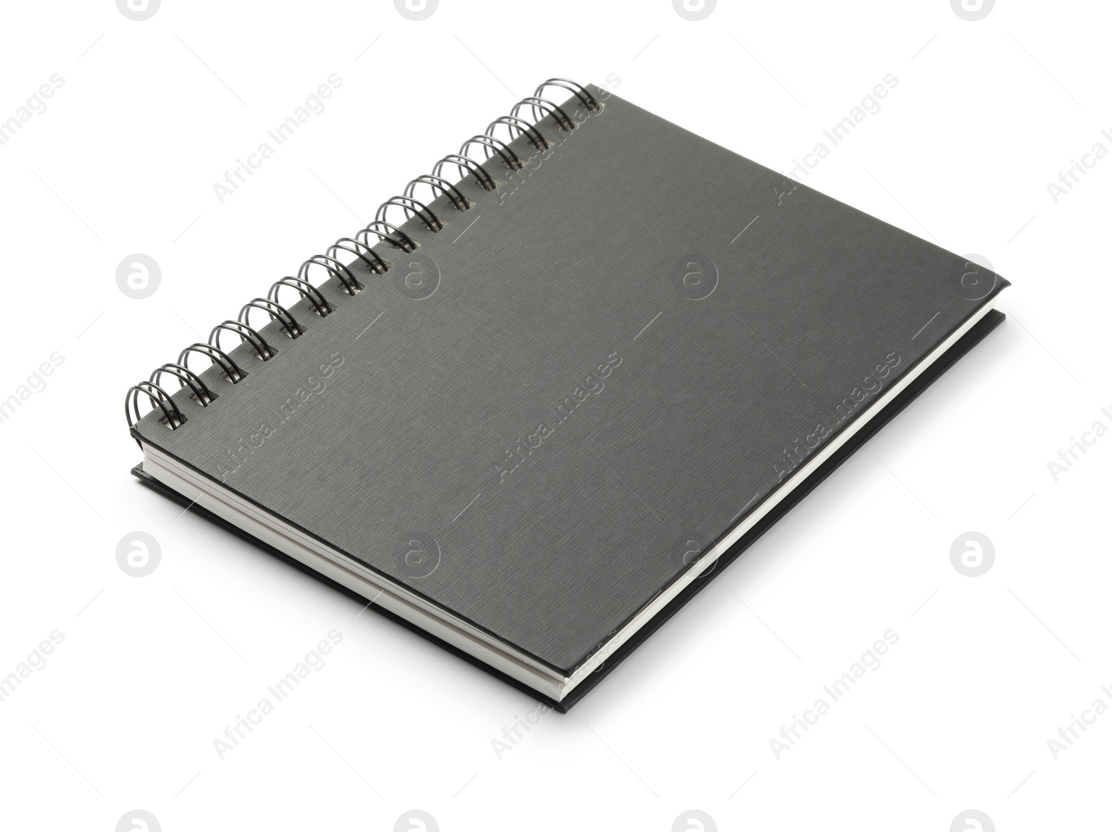 Photo of Closed black office notebook isolated on white