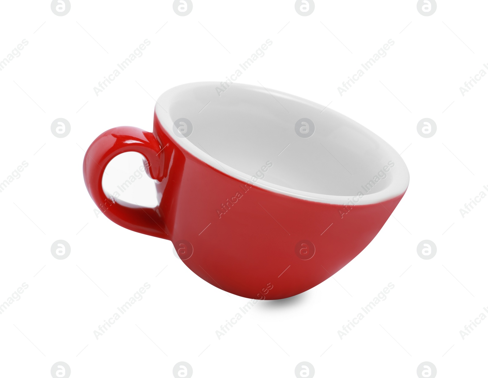 Photo of One red ceramic cup isolated on white