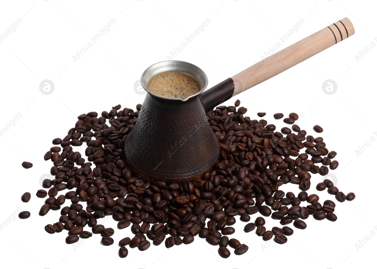 Photo of Metal turkish coffee pot with hot drink and beans on white background