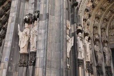 Photo of Cologne, Germany - August 28, 2022: Decorations of beautiful old gothic cathedral