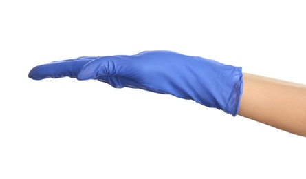 Woman in blue latex gloves holding something on white background, closeup of hand