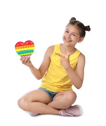 Photo of Girl with pop it fidget toy on white background