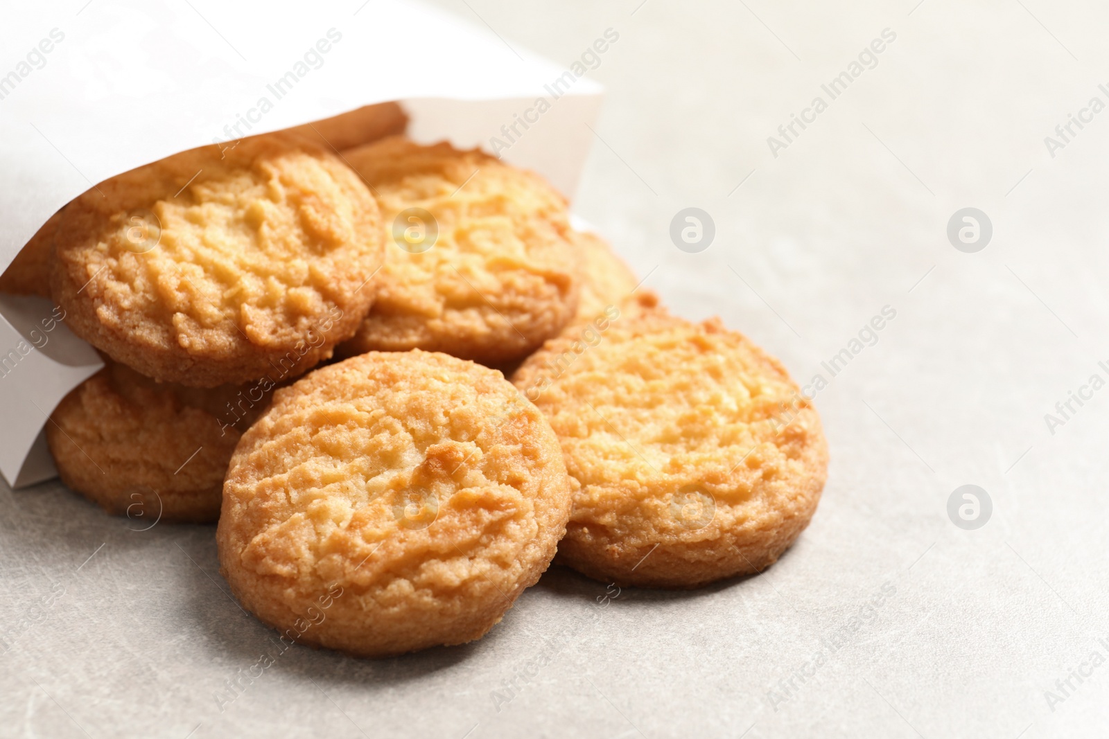 Photo of Paper bag with Danish butter cookies on table