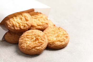 Photo of Paper bag with Danish butter cookies on table