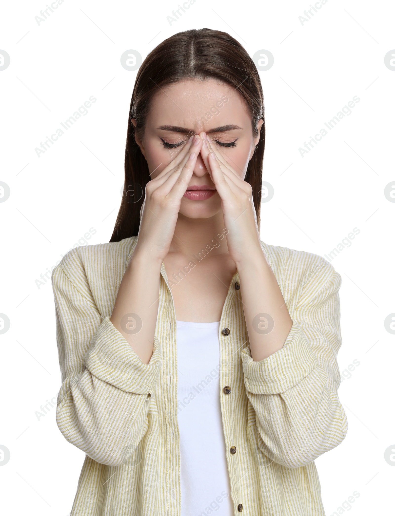 Photo of Young woman suffering from headache on white background