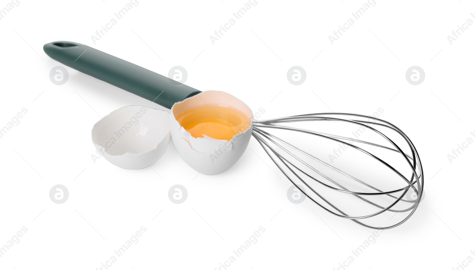 Photo of Whisk and broken egg isolated on white