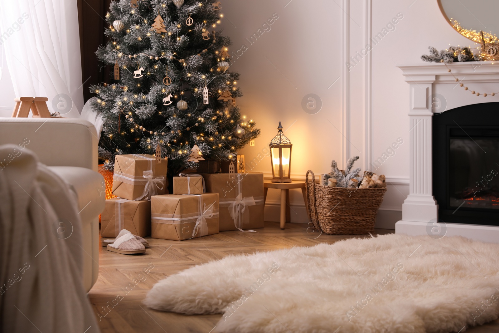 Photo of Beautiful room interior with Christmas tree and fireplace