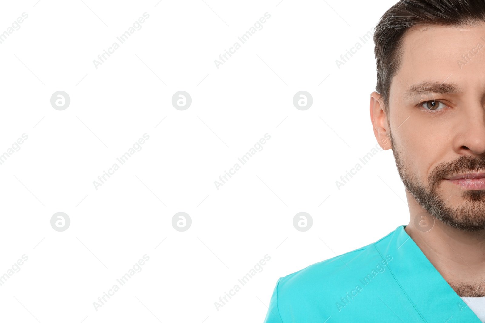 Photo of Doctor or medical assistant (male nurse) in uniform on white background, closeup