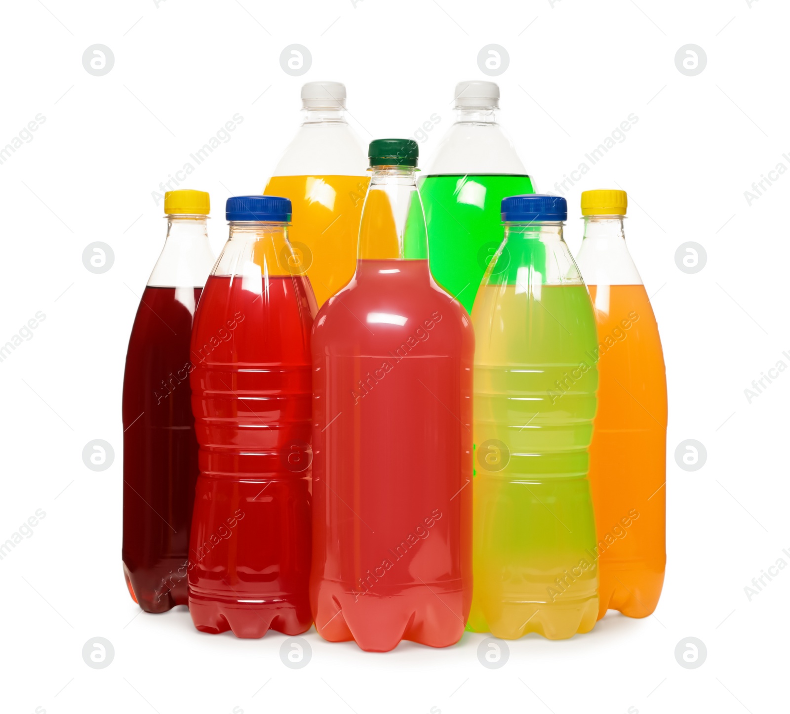 Photo of Bottles of soft drinks on white background