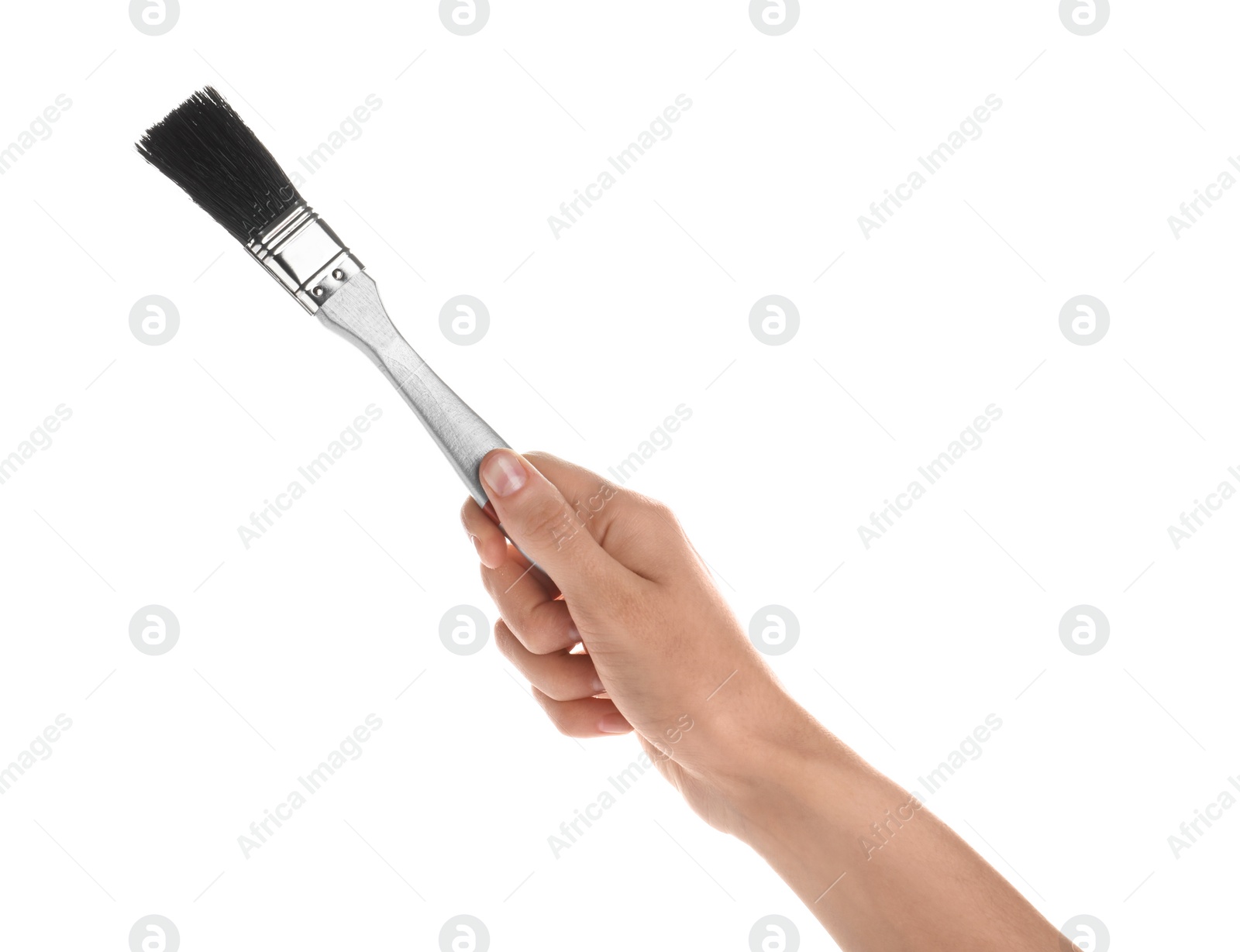 Photo of Woman holding paint brush on white background, closeup