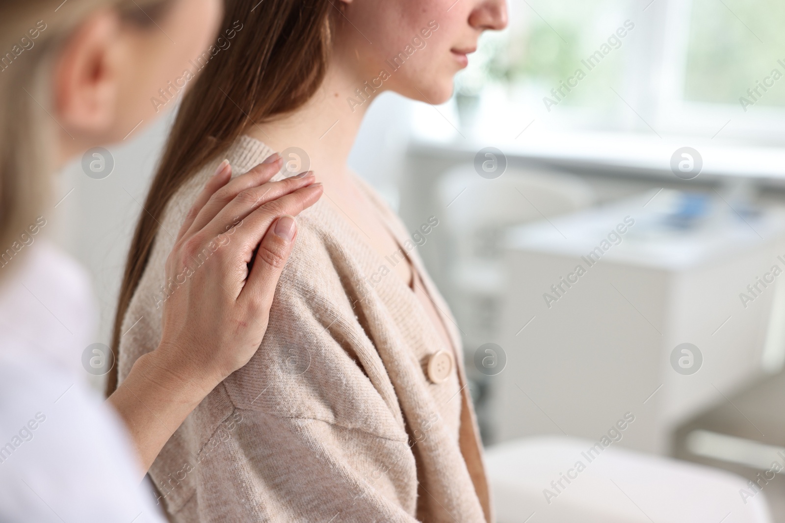 Photo of Professional doctor working with patient in hospital, closeup