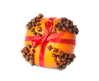 Pomander ball with red ribbon made of fresh tangerine and cloves isolated on white