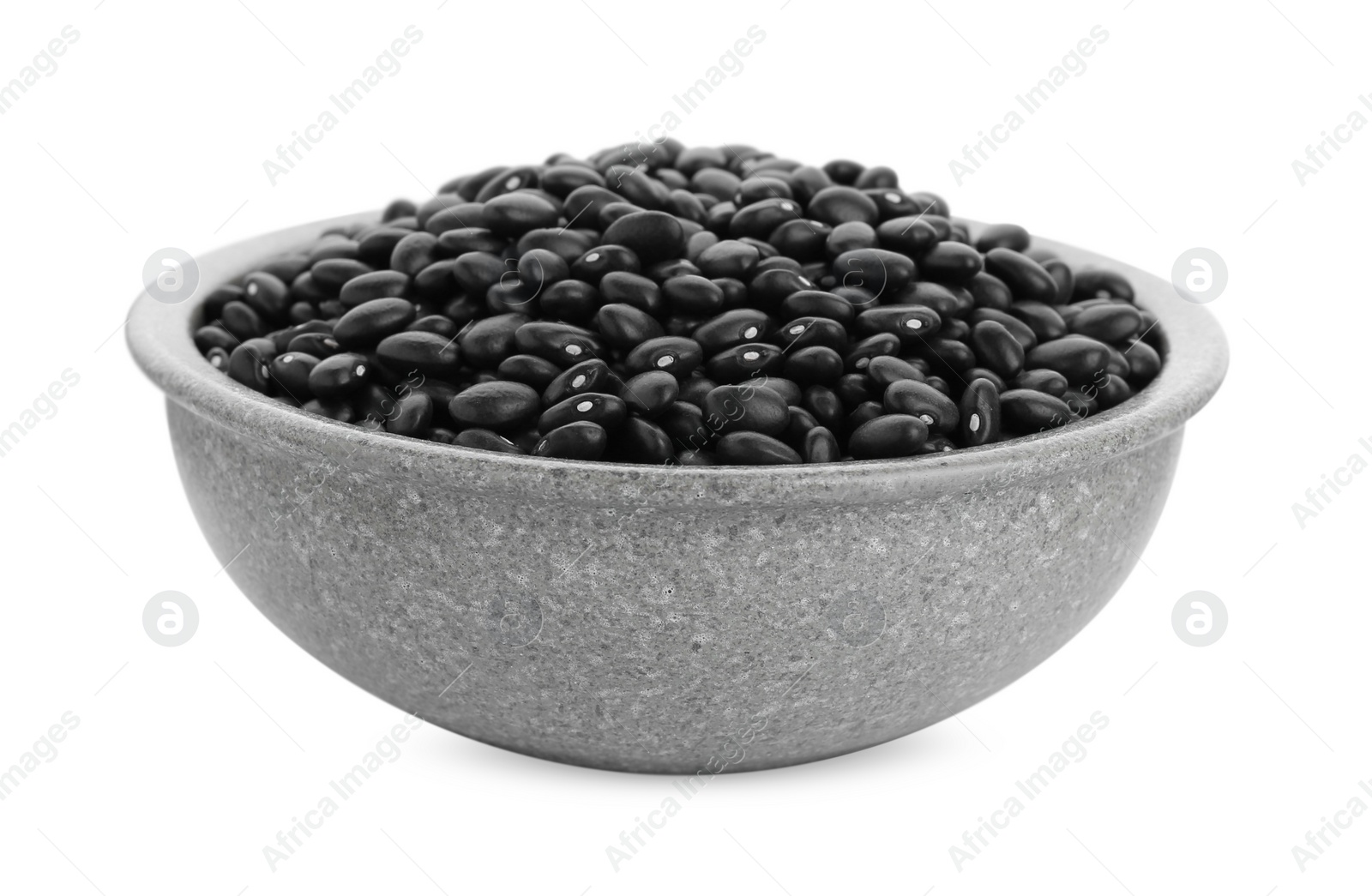 Photo of Bowl of raw black beans isolated on white