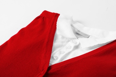 Photo of New stylish school uniform on white background, closeup