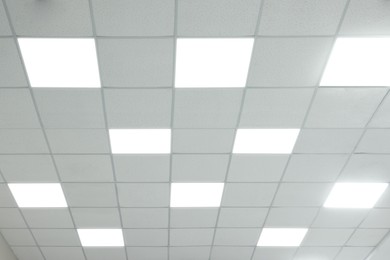 White ceiling with lighting in office room