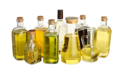 Photo of Vegetable fats. Glassware of different cooking oils isolated on white