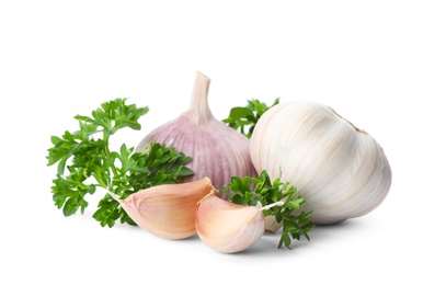 Photo of Green fresh parsley with garlic on white background