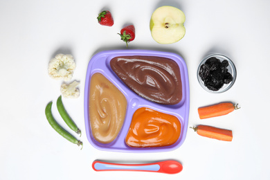 Photo of Flat lay composition with healthy baby food and ingredients on white background