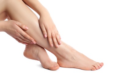 Woman with neat toenails after pedicure procedure isolated on white, closeup