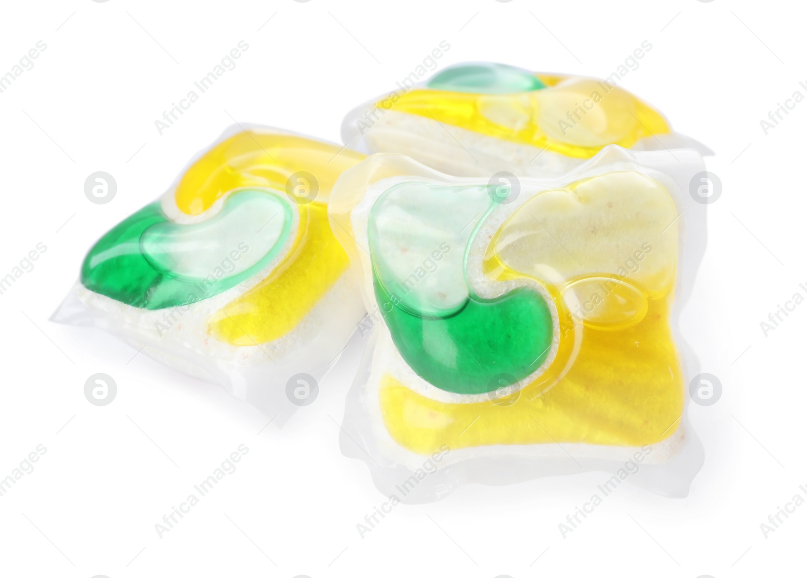 Photo of Many dishwasher detergent pods on white background