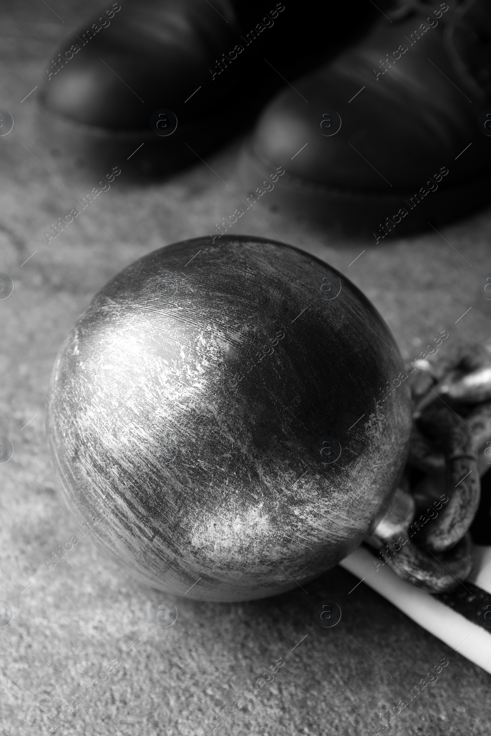 Photo of Prisoner ball with chain on grey table