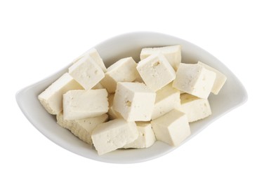 Pieces of delicious tofu on white background, top view. Soybean curd