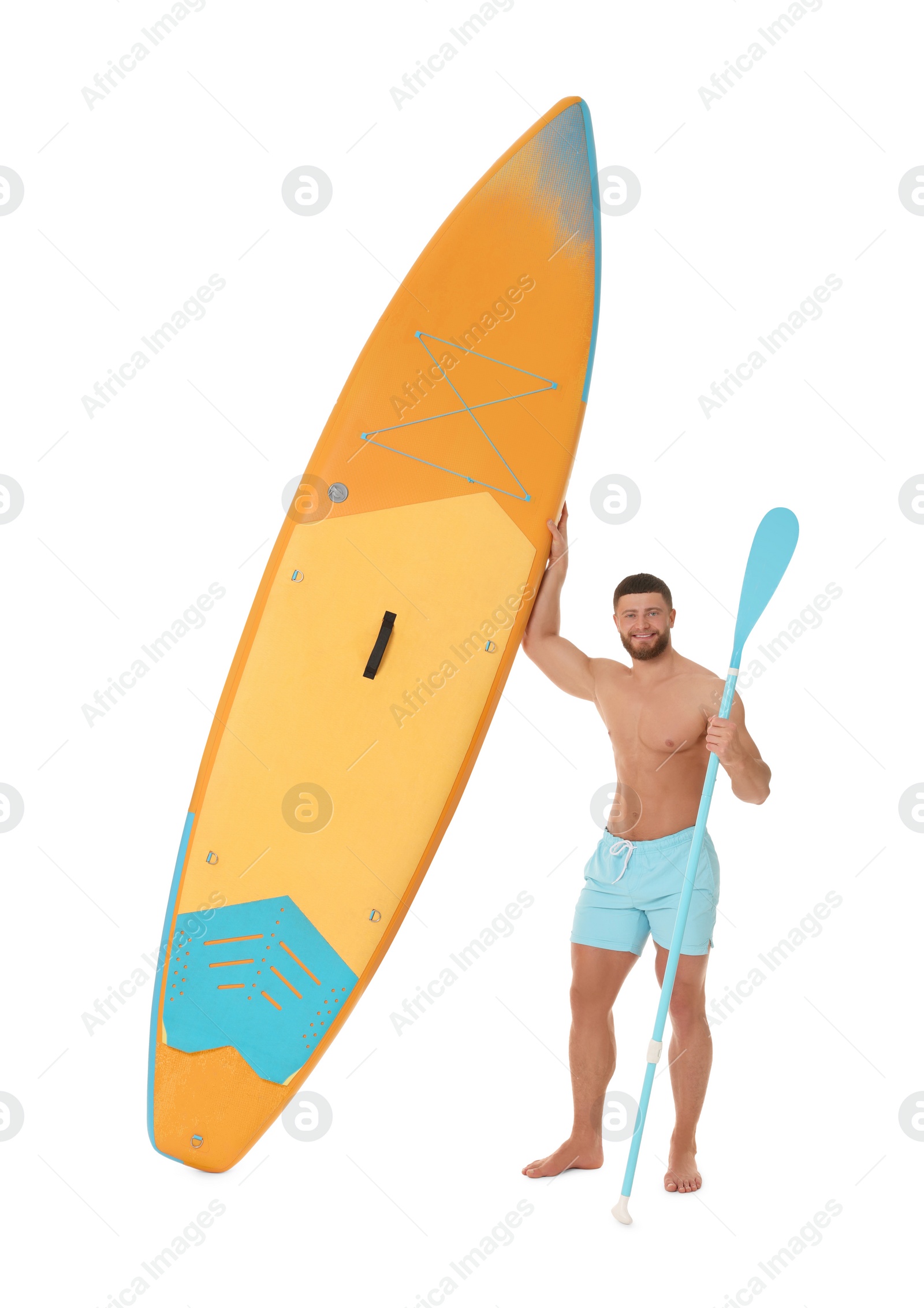 Photo of Happy man with orange SUP board and paddle on white background