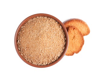 Photo of Fresh bread crumbs in bowl and toasts on white background, top view