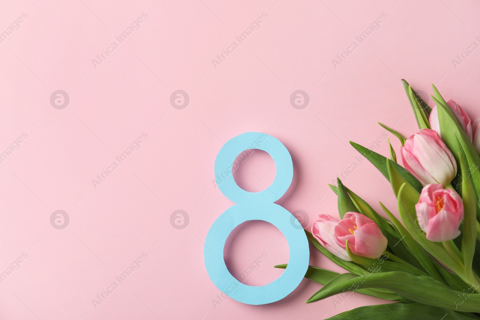 Photo of 8 March card design with tulips and space for text on pink background, flat lay. International Women's Day