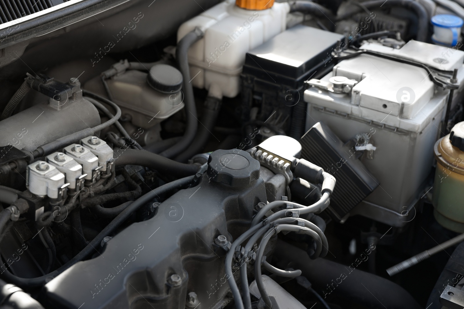 Photo of Closeup view of engine bay in modern auto