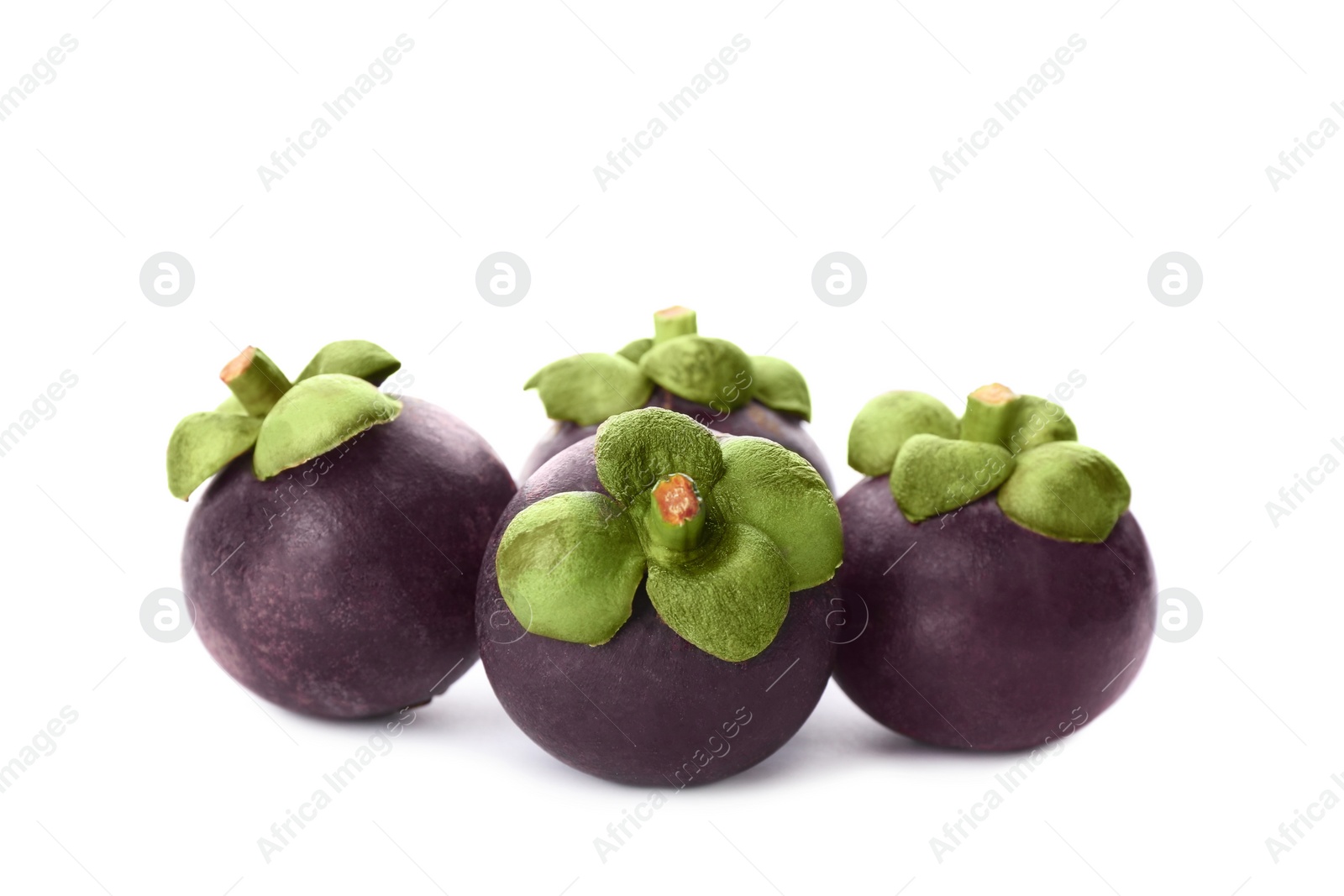 Photo of Fresh ripe mangosteen fruits on white background