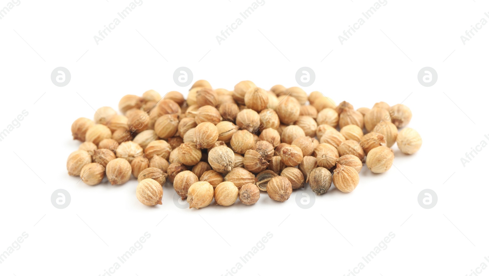 Photo of Heap of dried coriander seeds on white background