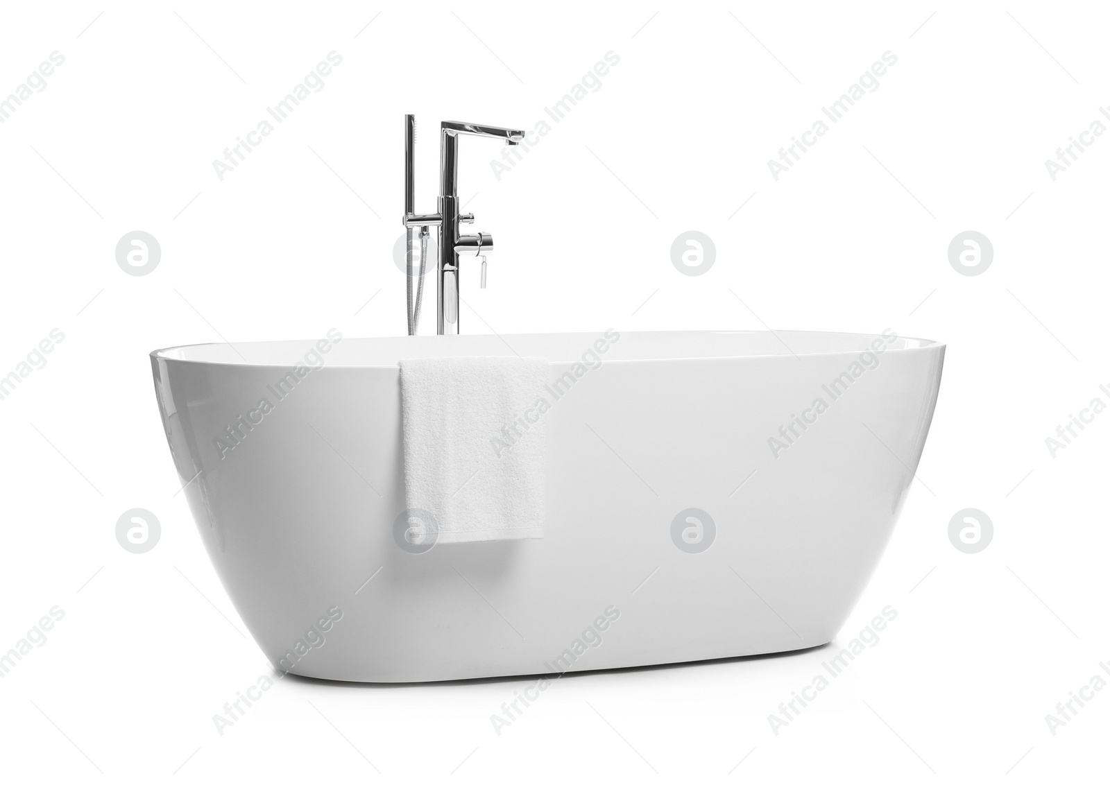 Photo of Modern clean ceramic bathtub isolated on white